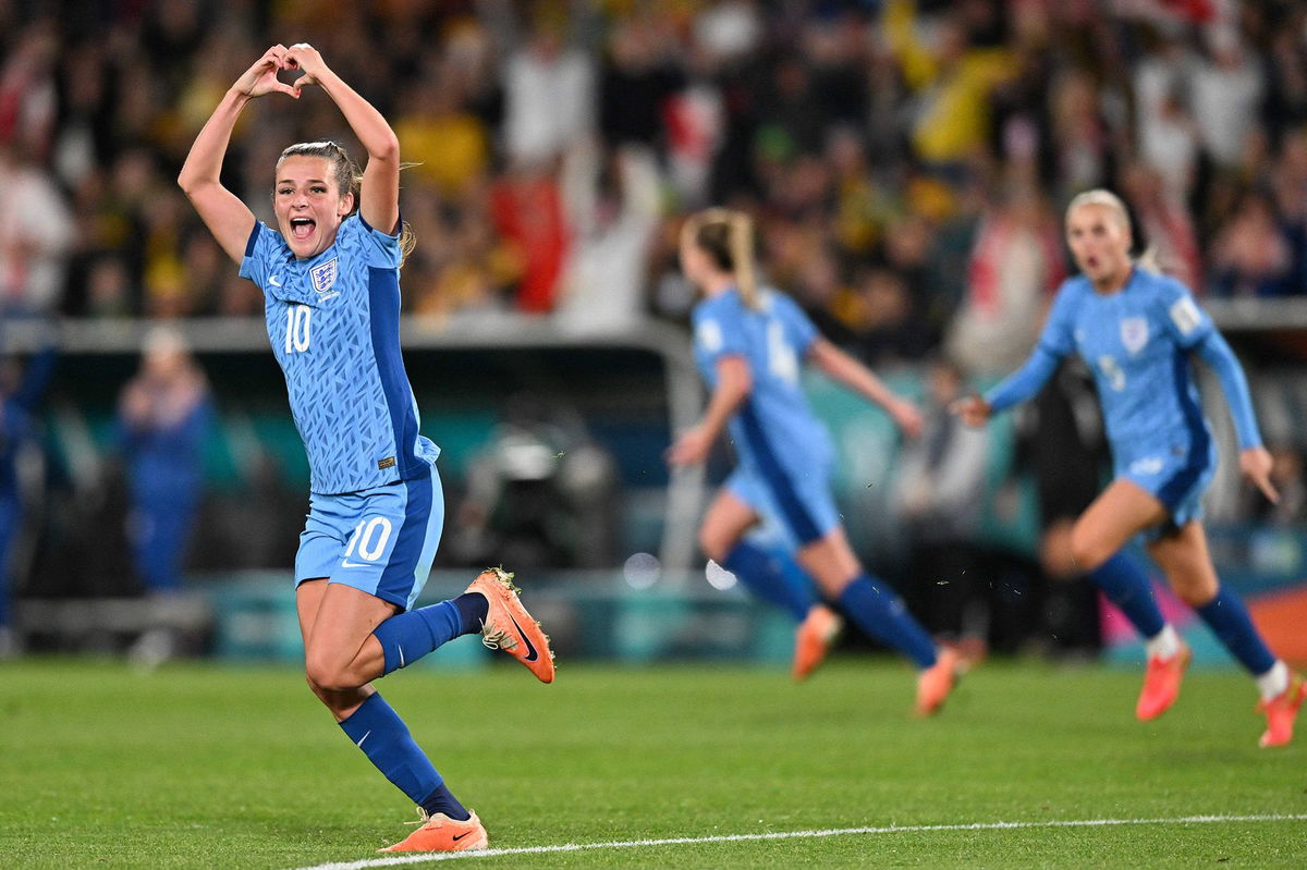 <i>Izhar Khan/AFP/Getty Images</i><br/>England players celebrate taking the lead in their semifinal against Australia.