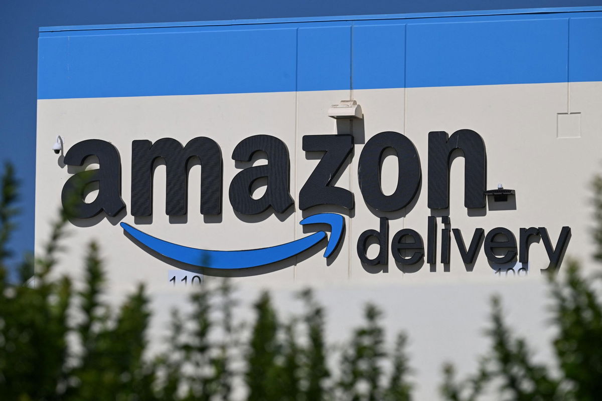 The Amazon delivery sign is seen on the exterior of the Amazon warehouse in Palmdale, California, on July 25. Amazon is raising its free shipping threshold for some customers.