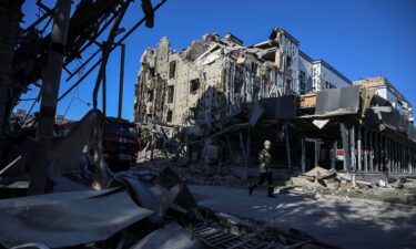 Rescuers work at the site of a building destroyed during a Russian missile strike in the Donetsk region city of Pokrovsk on August 8.