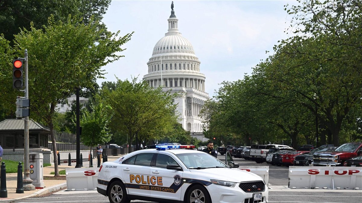 <i>Saul Loeb/AFP/Getty Images</i><br/>A US Capitol police officer stands by his car outside the Russell Senate Office Building in Washington