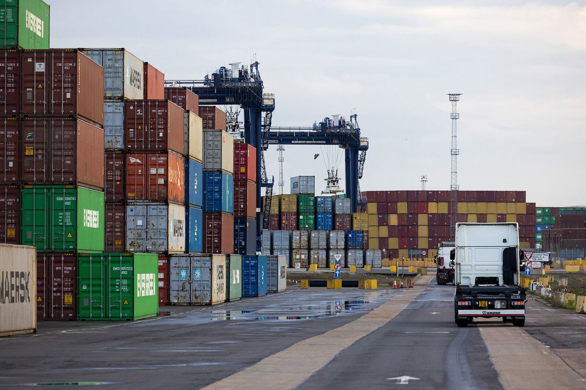 The UK economy grew slightly in the three months to June 30, driven by strong rises in manufacturing and consumer and government spending. Shipping containers on the dockside at the UK Port of Felixstowe seen in May 2023.