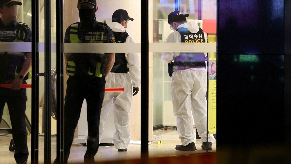 <i>Yonhap News Agency via Reuters</i><br/>Policemen examine a scene where at least 14 people were injured in Seongnam
