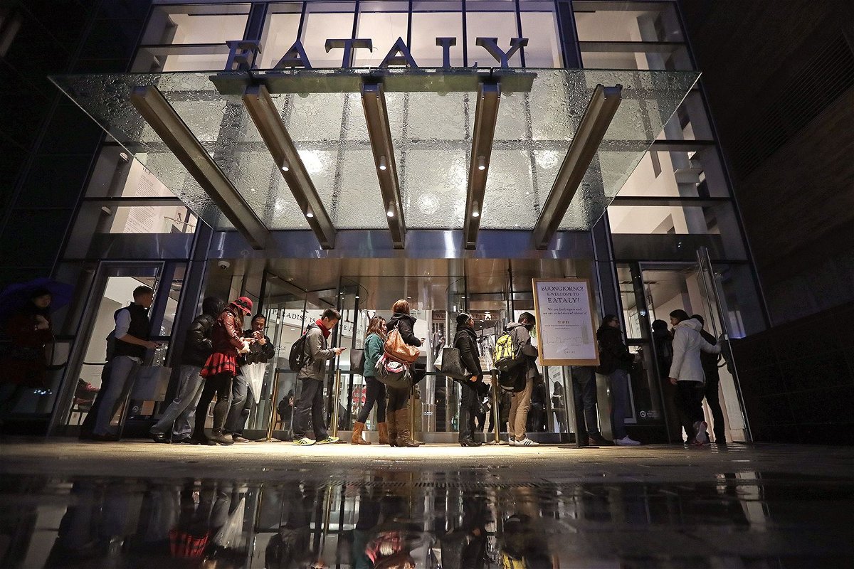 <i>Barry Chin/The Boston Globe/Getty Images</i><br/>A line forms outside the Boylston Street entrance at Eataly in the Prudential Center in Boston on November 29