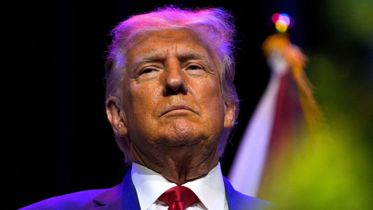 <i>Cheney Orr/Reuters</i><br/>Former President Donald Trump looks on as he attends the ALGOP Summer Meeting in Montgomery