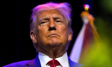 Former President Donald Trump looks on as he attends the ALGOP Summer Meeting in Montgomery