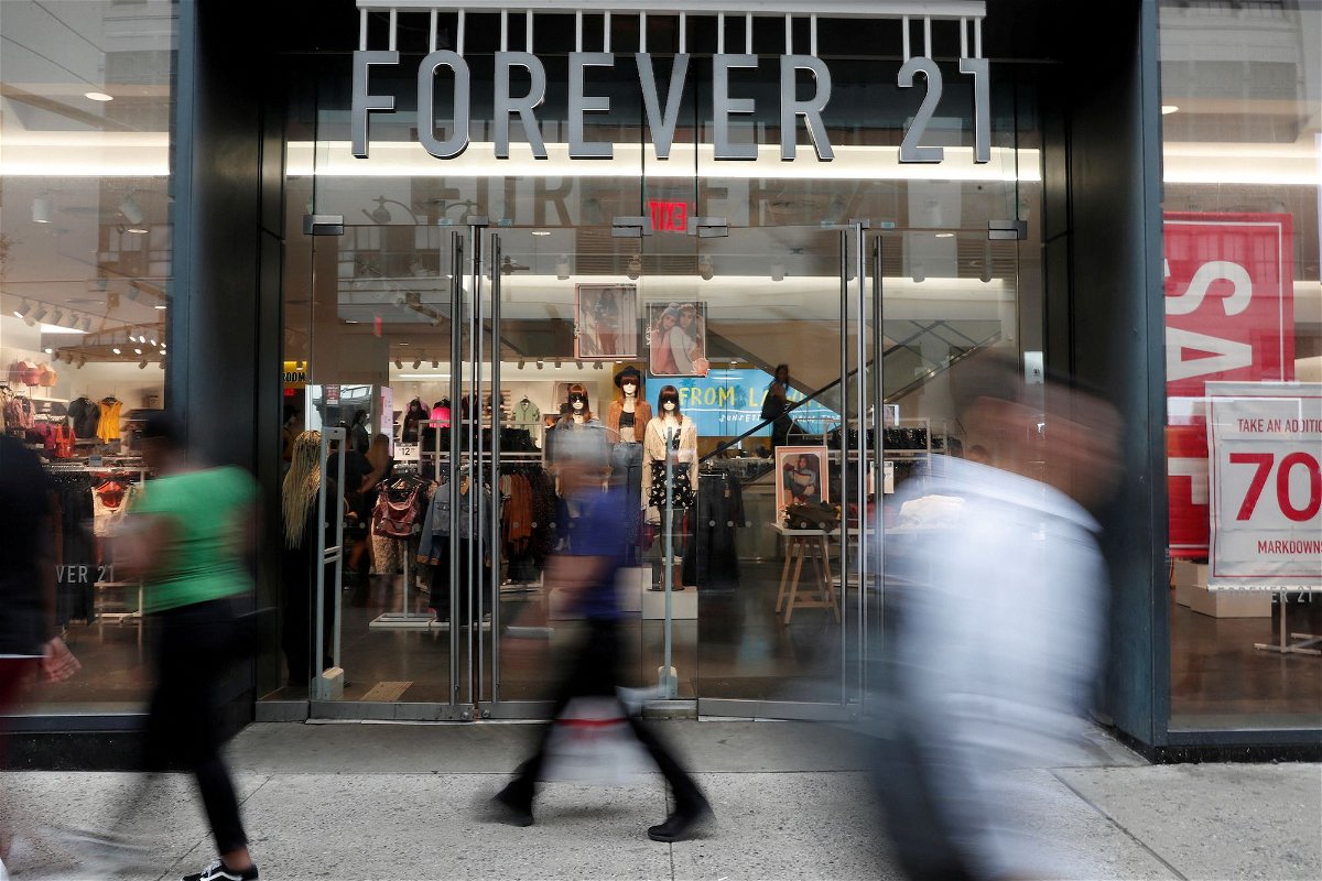 <i>Shannon Stapleton/Reuters</i><br/>People walk by the clothing retailer Forever 21 in New York City
