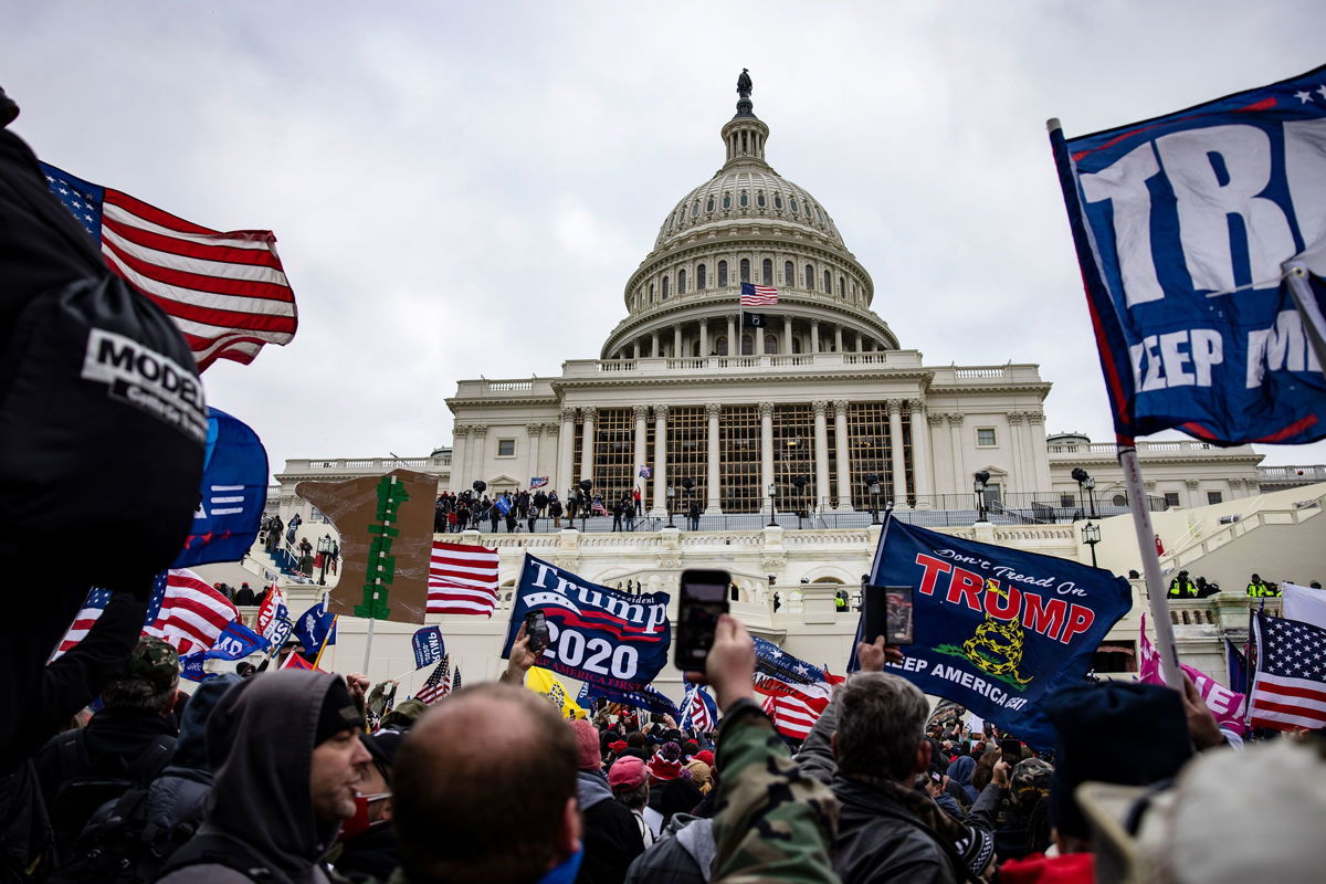 <i>Samuel Corum/Getty Images/FILE</i><br/>Pro-Trump supporters storm the U.S. Capitol following a rally with President Donald Trump on January 6