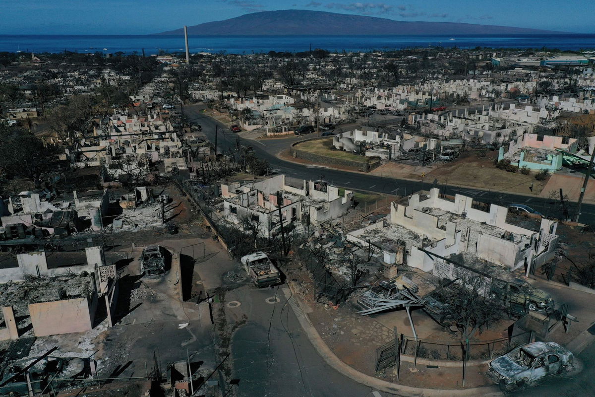 <i>Patrick T. Fallon/AFP/Getty Images</i><br/>An aerial image shows destroyed homes and vehicles on August 17 after a wind-driven wildfire burned through Lahaina