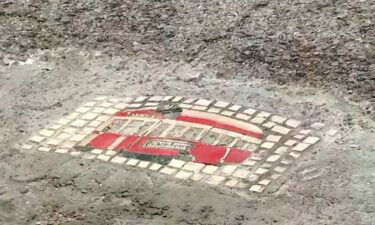 Some St. Louis artists are hoping to solve the city’s pothole problem by filling them with cement and decorating them with mosaics.