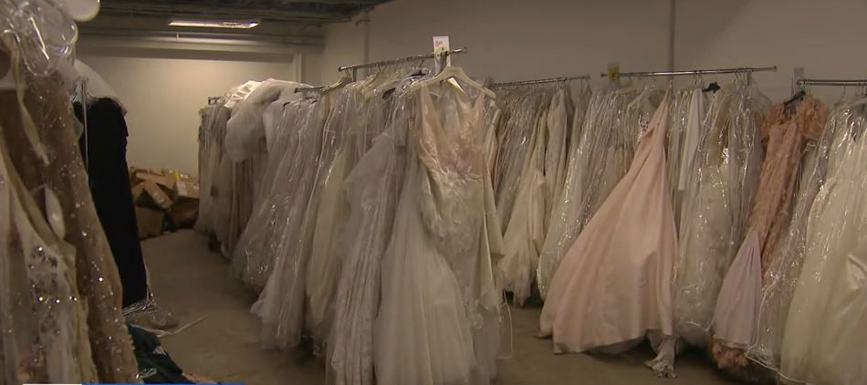 <i></i><br/>North Andover-based Brides Across America is now scrambling to recover after flooding from a broken dam ruined hundreds of wedding dresses that were supposed to be donated to members of the military