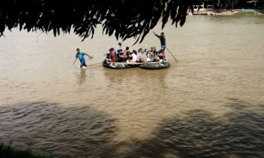 There’s a bustling trade in people and goods across the Guatemala-Mexico river border this week. But almost the entire flow of people skirts the route across the road bridge and tries to avoid official eyes by floating across the water.