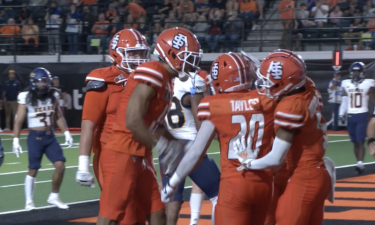 Bengal players celebrate Aiden Taylor's touchdown run