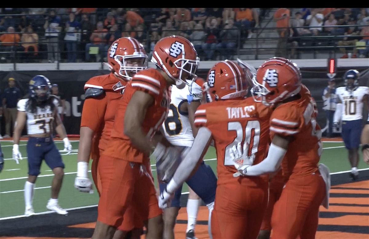 Bengal players celebrate Aiden Taylor's touchdown run