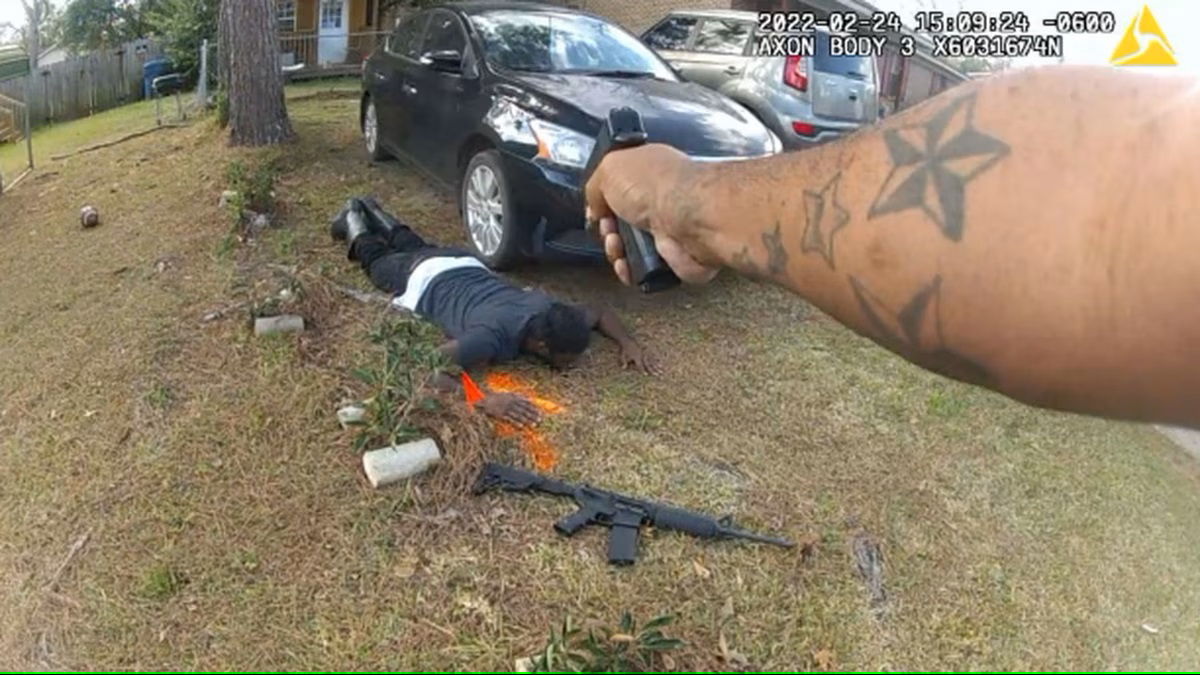 <i>U.S. District Court/WALA</i><br/>This image from a police officer-worn body camera shows an officer pointing his service weapon at Broderick Tramaine Young after a shootout in Monroeville