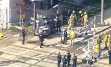 Rescue crews responded to a collision between a Metro train and a car at S Raymond Avenue and E. California Blvd. in Pasadena to help a driver trapped in their vehicle following the crash.