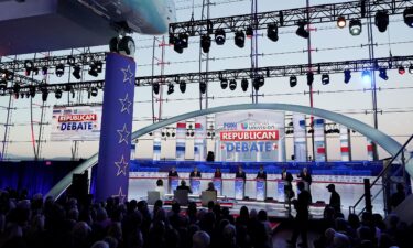 Republican presidential candidates stand behind their podiums during the GOP primary debate at the Ronald Reagan Presidential Library in Simi Valley