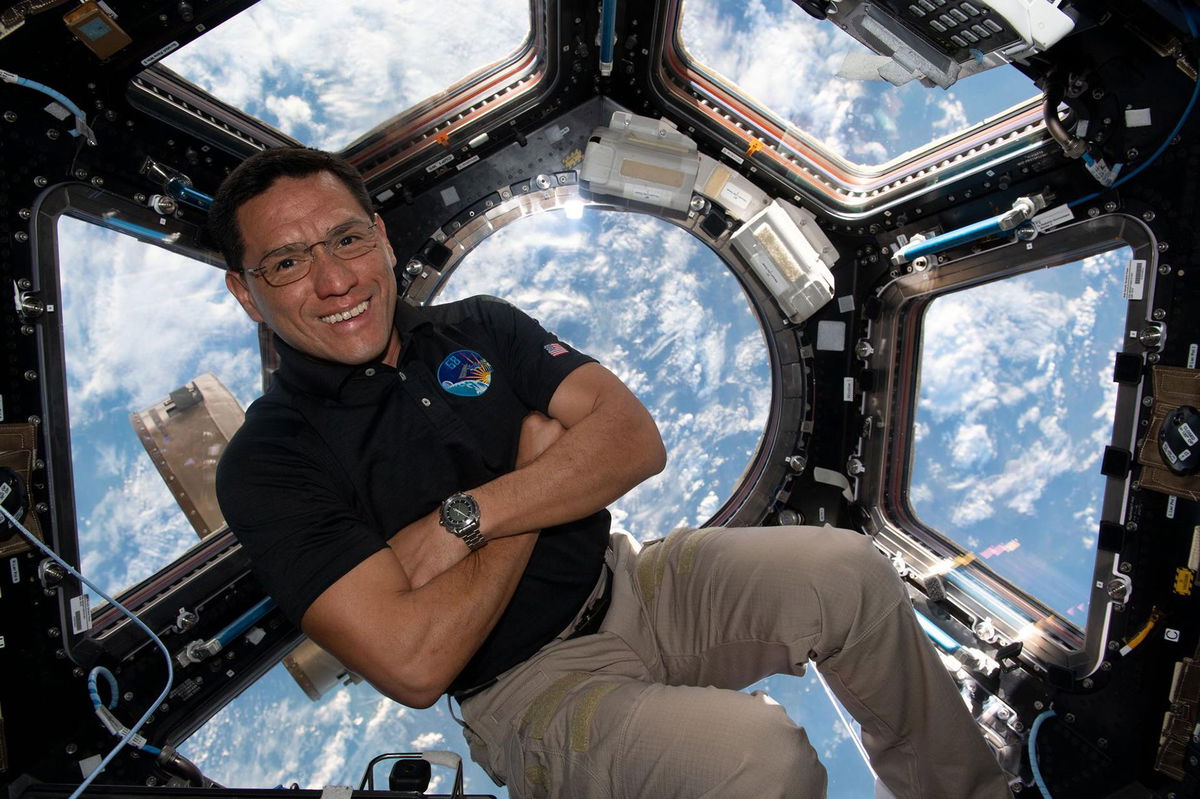 NASA astronaut and Expedition 68 Flight Engineer Frank Rubio is seen inside the cupola, the International Space Station's 