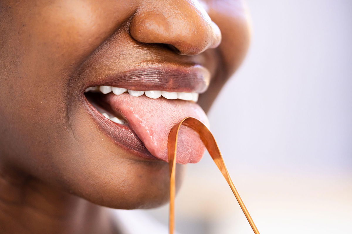 Tongue scrapers are metal or plastic devices used to clean the surface of the tongue. There are no official guidelines on how often you should use one.