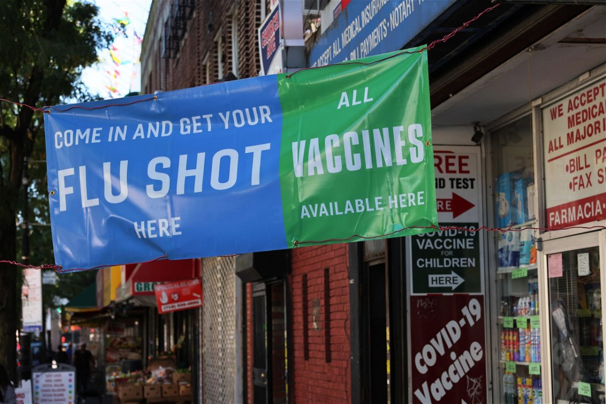 A banner for vaccines is seen at a pharmacy on September 1 in the Flatbush neighborhood of Brooklyn borough in New York City. Every year since 2010, the US Centers for Disease Control and Prevention has recommended that everyone in the country ages 6 months and older receive a flu vaccine.
