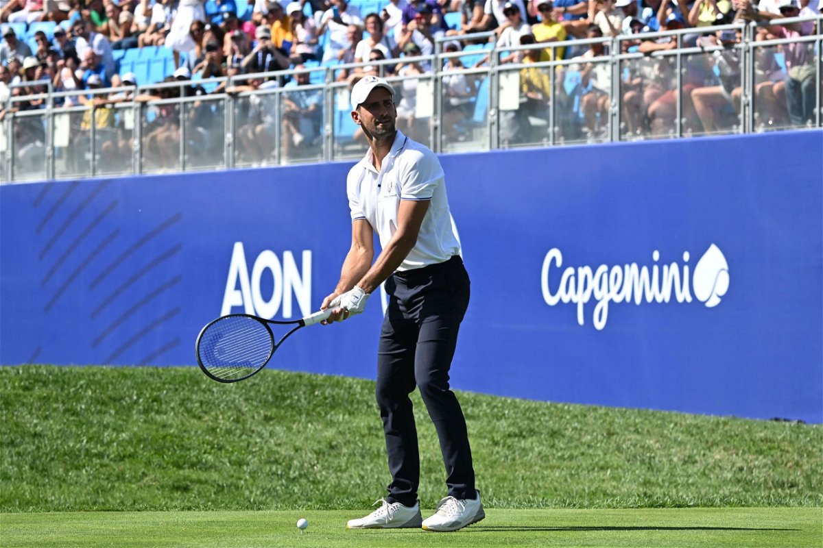 <i>Jamie Squire/Getty Images</i><br/>Djokovic reacts as spectators cheer his tee shot on the 16th hole during the All-Star Match on September 27.