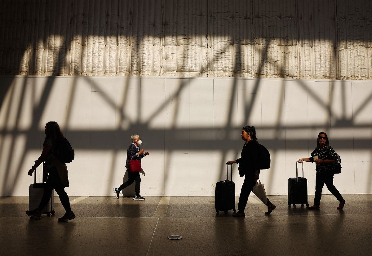<i>Mario Tama/Getty Images</i><br/>Travelers walk in the international terminal at Los Angeles International Airport (LAX) on August 31 in Los Angeles