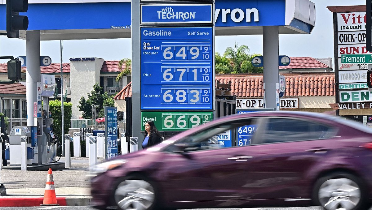 A sign displays the price of gas at more than 6 USD per gallon, at a petrol station in Alhambra, California, on September 18. Oil prices hit a 10-month high on September 15.