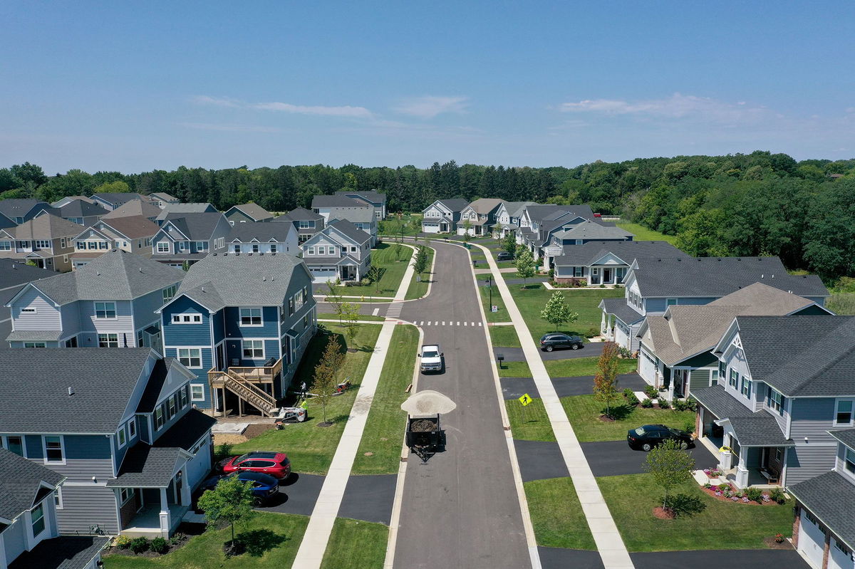 An aerial view shows a subdivision that has replaced the once rural landscape on July 19 in Hawthorn Woods, Illinois. With homeowners reluctant to sell their homes and give up their existing low mortgage rates the demand for new homes has spiked.