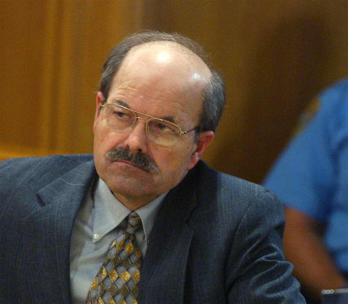 <i>Bo Rader/Pool/Getty Images</i><br/>Confessed serial killer Dennis Rader listens to testimony in the sentencing phase of his trial on August 17