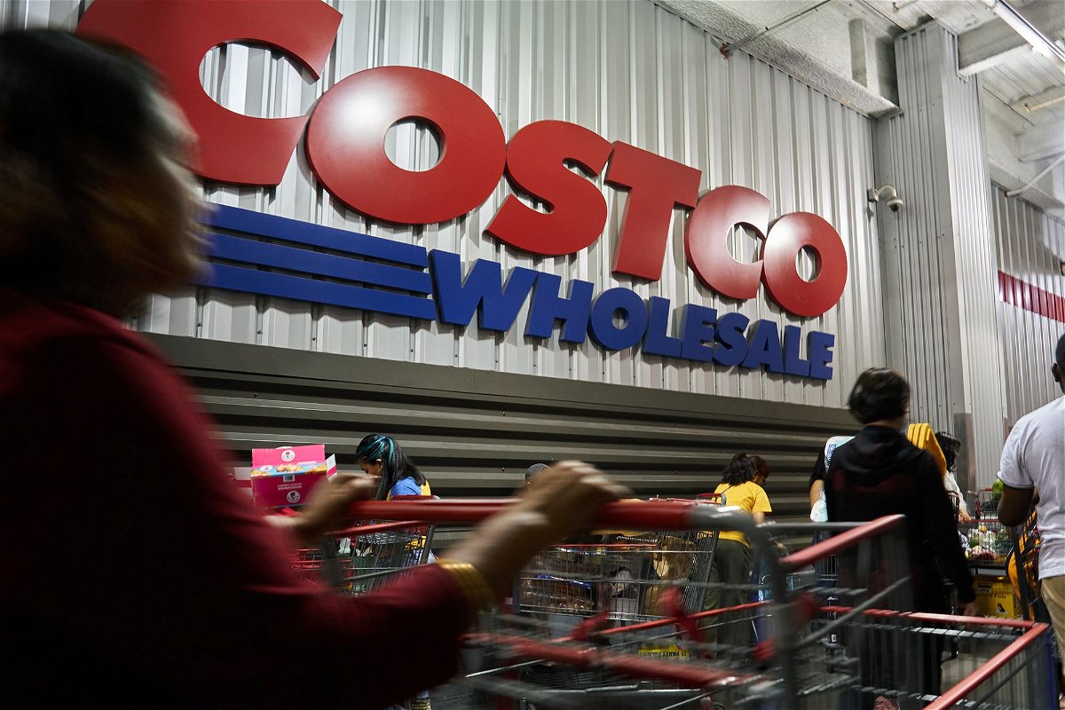 Shoppers outside a Costco store in the Queens borough of New York, US, on Saturday, May 13. Costco is now offering members online health checkups for as low as $29.