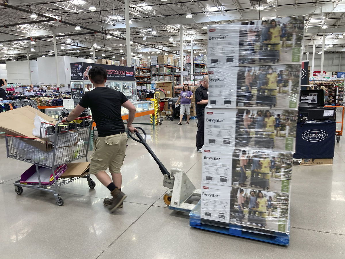 A worker guides a pallet of goods to a display spot in a Costco warehouse on July 8, 2022 in Thornton, Colorado. Wholesale inflation accelerated for the second month in a row, the Bureau of Labor Statistics reported September 14.