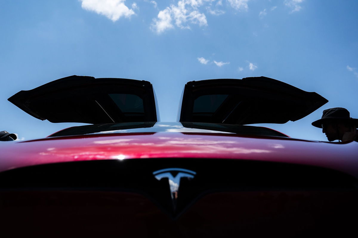 Attendees examine Tesla electric cars during the Electrify Expo In D.C. on July 23 in Washington, DC. Tesla’s Dojo supercomputer could fuel a $500 billion jump in the electric vehicle maker’s market value, analysts at Morgan Stanley said in a note on September 11.