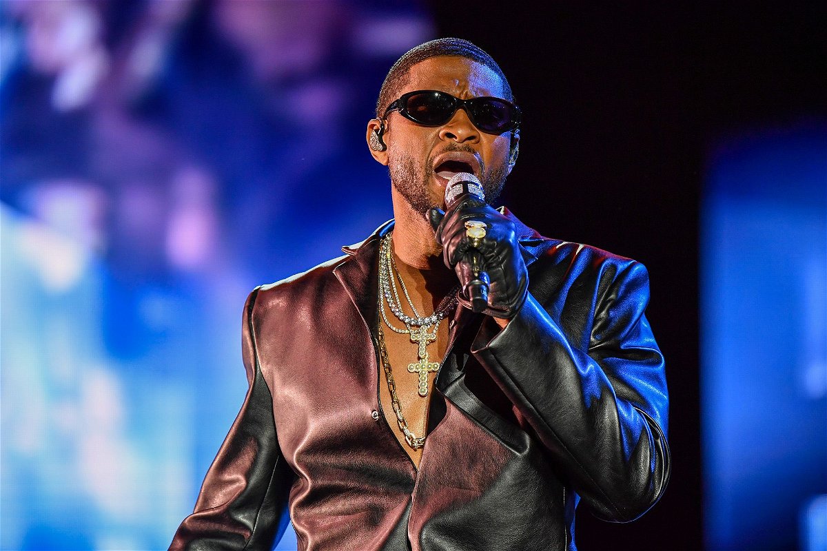 Usher performs onstage during the Lovers & Friends music festival at the Las Vegas Festival Grounds in May.