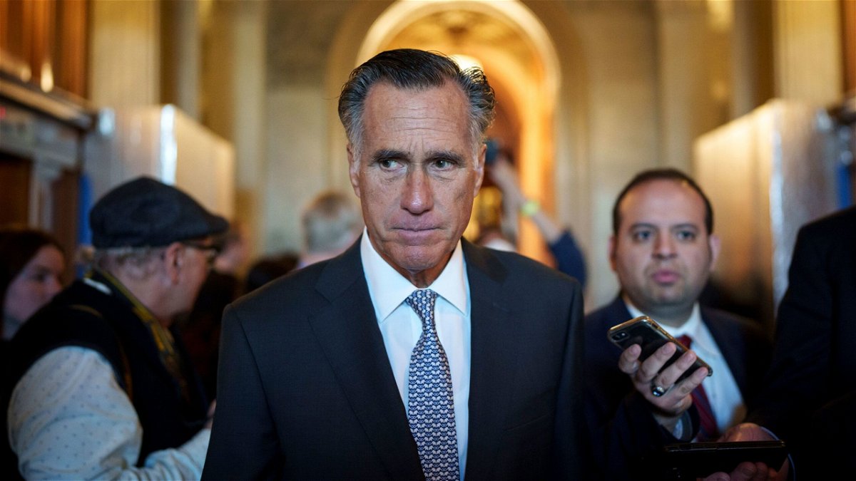 Sen. Mitt Romney leaves the Senate floor at the Capitol on November 16