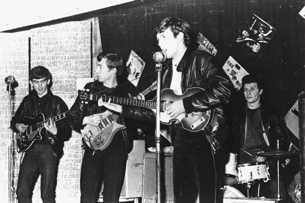 British rock group The Beatles perform in a club  prior to signing their first recording contract, Liverpool, England, 1962.