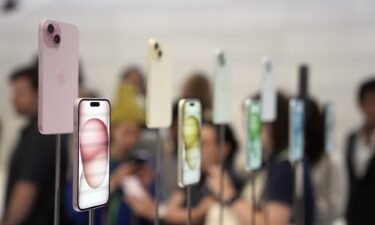 iPhone 15 and 15 Plus models are displayed during an announcement of new products on the Apple campus on September 12 in Cupertino