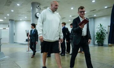 Sen. John Fetterman walks through the Senate subway at the Capitol on June 12 in Washington