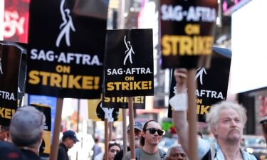 SAG-AFTRA members and supporters are seen here in New York in August. Several actors are offering experiences to the highest bidder in the Union Solidarity Coalition’s new eBay auction in an effort to help crew members who’ve lost their healthcare.