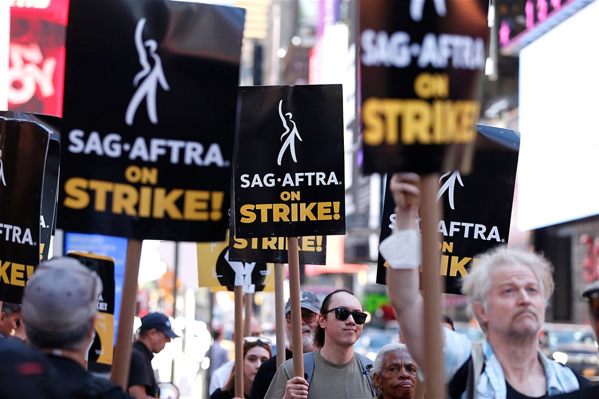 <i>John Lamparski/Getty Images</i><br/>SAG-AFTRA members and supporters are seen here in New York in August. Several actors are offering experiences to the highest bidder in the Union Solidarity Coalition’s new eBay auction in an effort to help crew members who’ve lost their healthcare.