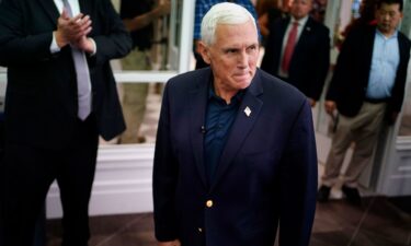 Former Vice President Mike Pence arrives at a campaign event in Henniker