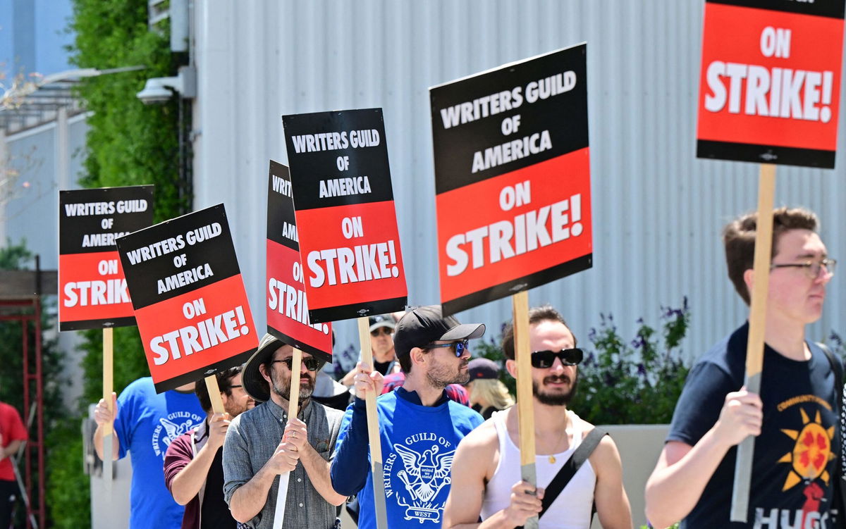 Writers picket in front of Netflix on Sunset Boulevard in Hollywood, California, on May 2 as the Writers Guild of American (WGA) goes on strike.