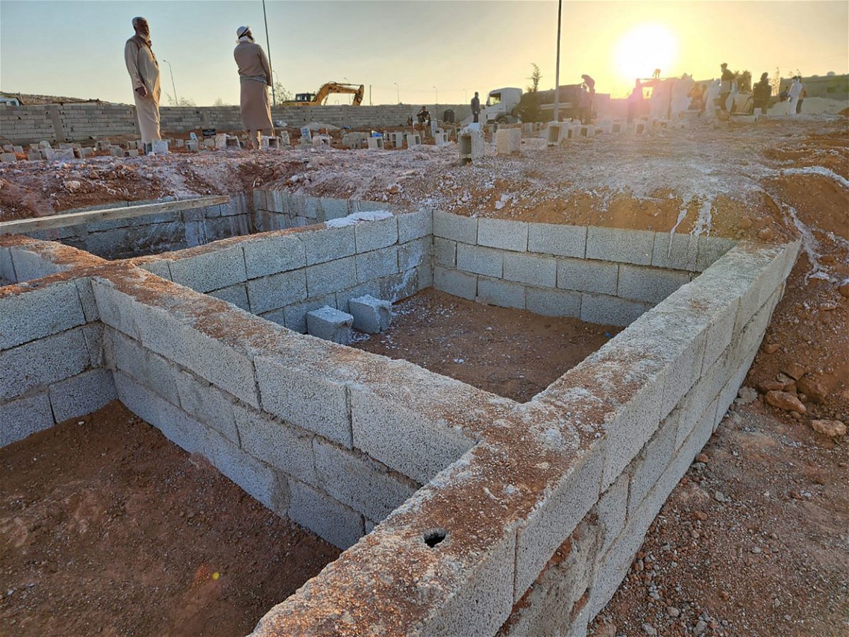 <i>Sarah Sirgany/CNN</i><br/>Graves are dug at the Tartoba cemetery outside Derna