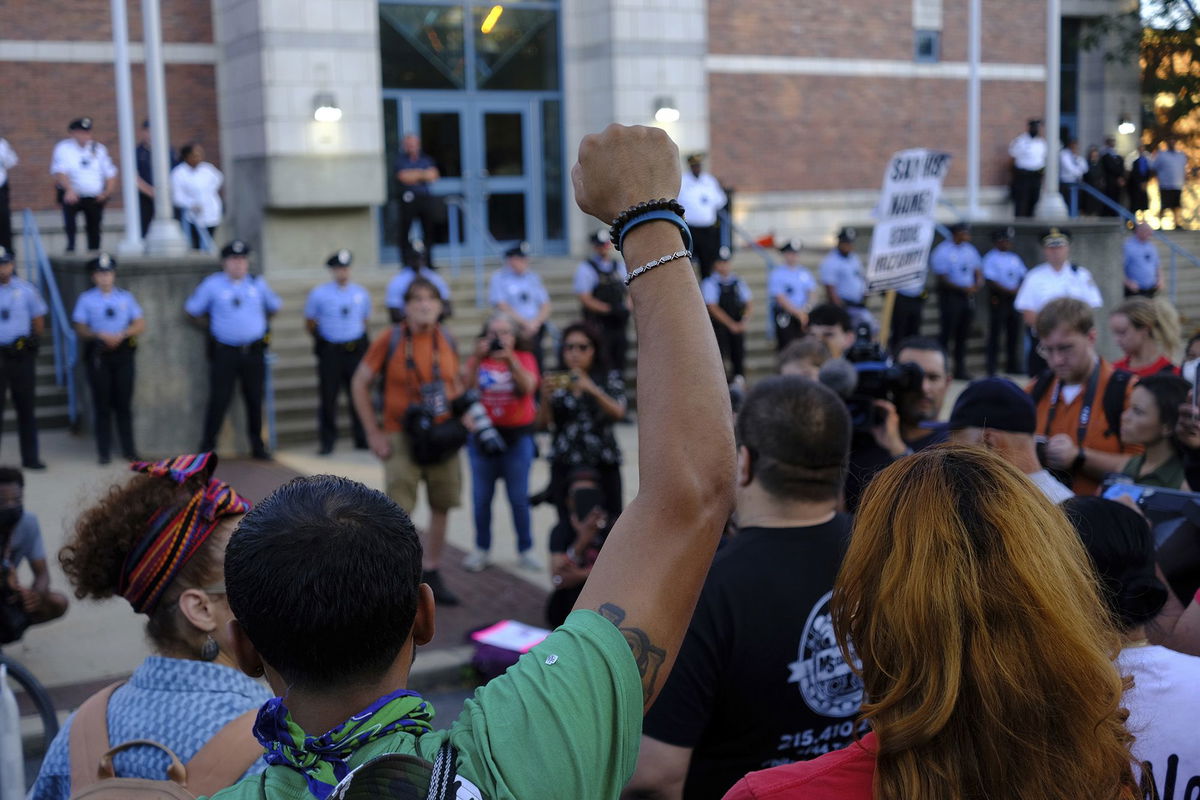 <i>Bastiaan Slabbers/NurPhoto/AP</i><br/>Demonstrators in Philadelphia demand police accountability and justice for Eddie Irizarry on August 31.