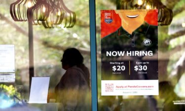 A now hiring sign is posted at a Panda Express restaurant in August 2022 in Marin City