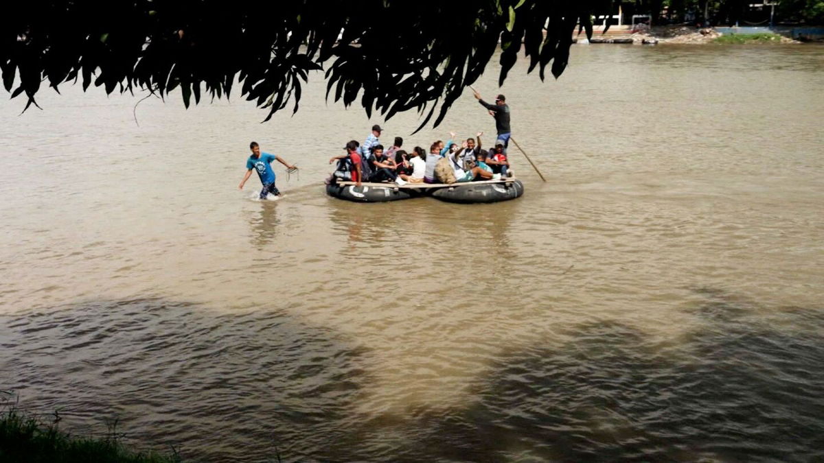 <i>CNN</i><br/>There’s a bustling trade in people and goods across the Guatemala-Mexico river border this week. But almost the entire flow of people skirts the route across the road bridge and tries to avoid official eyes by floating across the water.