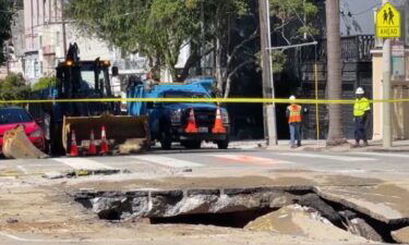 A water main break in San Francisco's Cow Hollow neighborhood has created a massive sinkhole at Fillmore and Green Streets Monday.