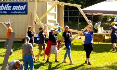 Hundreds of volunteers showed up on Wednesday to help build the Candace Pickens Memorial Park in Asheville