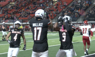 ISU's Cyrus Wallace celebrates touchdown with teammates
