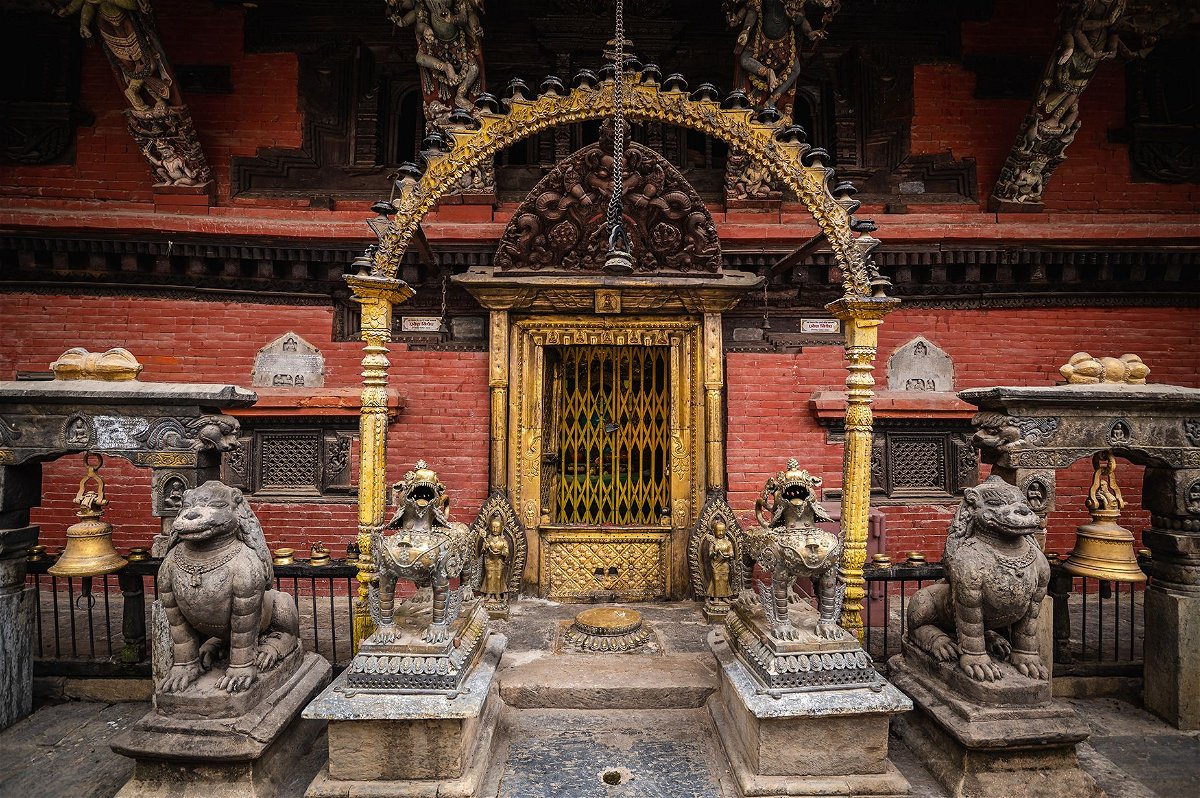 Intricate carvings and bronzes on display outside one of the monastery buildings.
