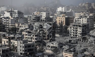 A view of damaged buildings as the Israeli airstrikes continue on its 16th day in Gaza City