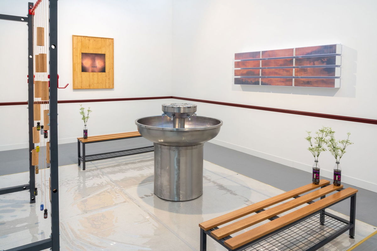 Adam Farah-Saad's debut at the Public Gallery booth included a steel 6-person fountain pumping KA grape soda.